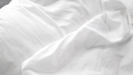 Airy soft white bedsheet background with trendy natural light setting