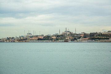 Spring, Istanbul view from the sea. high-rise buildings, modern glass city and historic buildings. cityscape of Istanbul, Turkey, a popular tourist destination. Panoramic view of the city