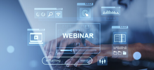 Webinar and e-learning technology concept with hands typing on laptop and digital icons.