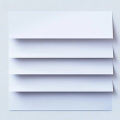 Five White Paper Sheets on Textured Light Blue Background