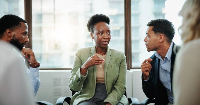 Business people, meeting and discussion with team for support group or rehabilitation. Woman, employee or talking with colleagues for counseling therapy, recovery or work intervention at office