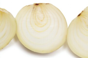 Close-up of sliced white onion rings and layers on white background
