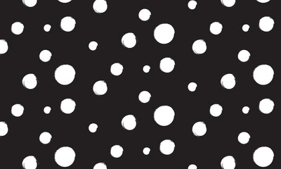 Hand drawn dotted seamless pattern in grungy style. rough organic hand drawn polka pattern in white color on dark background.