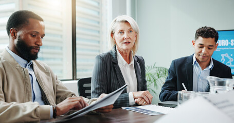 Obraz premium People, talking and meeting with document in office for planning, neuroscience and innovation ideas. Manager, presentation and briefing with paperwork, brain technology and proposal for neurofeedback