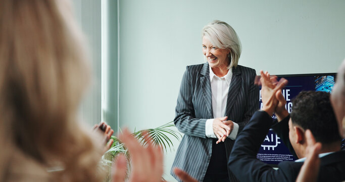 Applause, speaker and woman with smile, boardroom and training for machine learning or presentation. Achievement, colleagues and people with successful meeting, clapping or excited for ai in business