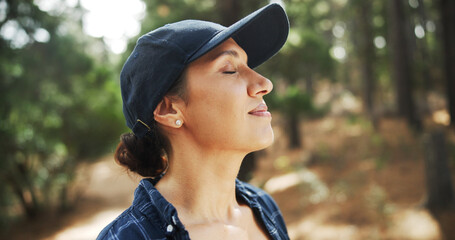 Outdoor, holiday and woman with breathing for hiking, nature and adventure for relaxing on weekend. Female person, hiker and wellness with peace for traveling, explore woods and fresh air for tourist