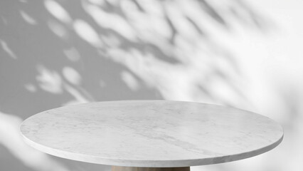 Round marble table top with tree leaves shadow drop on white wall background for mockup product display