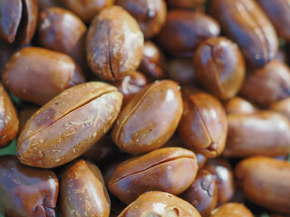 Roasted, shelled, dark brown peanuts