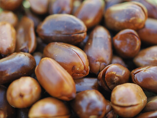 Roasted, shelled, dark brown peanuts
