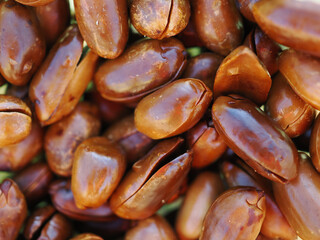 Roasted, shelled, dark brown peanuts