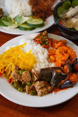 Indonesian-style dish, captured on May 10, 2025. A flavorful combination of spices, herbs, and traditional ingredients, showcasing the bold and authentic taste of Indonesian cuisine
