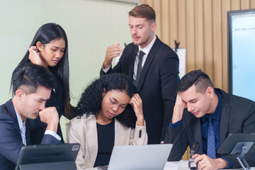 frustrated multiracial business people seriously meeting in office room,bad condition business conference,problem,worry of results business crisis