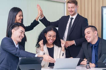 multiracial business people meeting at table in office room,doing gesture sign of success business,applause,hands high five,hands fist and smile happily