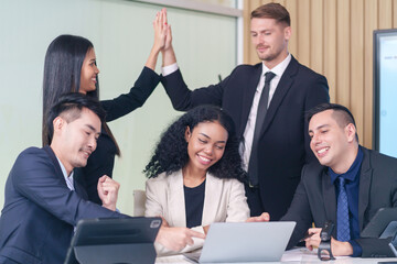 multiracial business people meeting at table in office room,doing gesture sign of success...