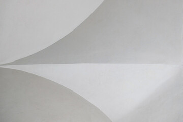 "Minimalist abstract composition with geometric shapes. Conceptual photography, ideal as a texture or elegant background for graphic designs, presentations or architectural projects."