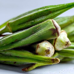 Fresh Okra CloseUp of Green Okra Pods isolated on white Background