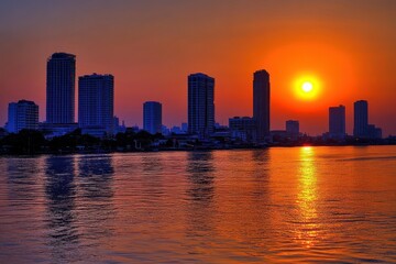Fototapeta premium Dawn breaks over Bangkok s skyline evening city view