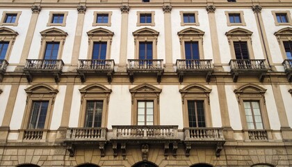 Fototapeta premium Classic Architectural Facade with Symmetrical Windows and Balconies