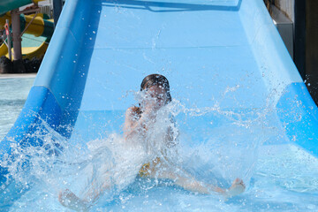 Girl on a water slide in a water park