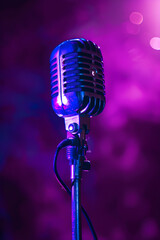 close-up of a microphone on a purple background