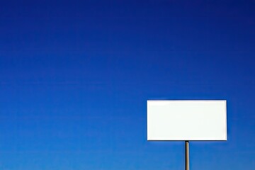 Blank billboard against vibrant blue sky (1)