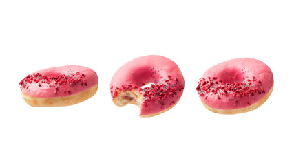 Pink glazed donuts are flying in the air isolated on white background