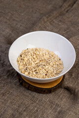 fruits mixed with porridge, dried fruits and berries to give a pleasant taste to the finished oatmeal, close up