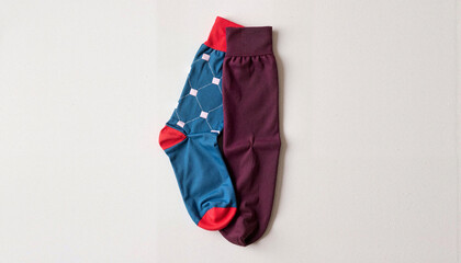 Different socks of different colors on a light background