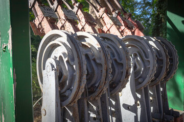 A row of old, rusty, and dirty switches are lined up
