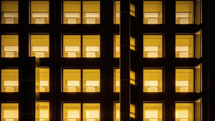 Fototapeta premium Modern Skyscraper with Glowing Golden Windows in Evening Light