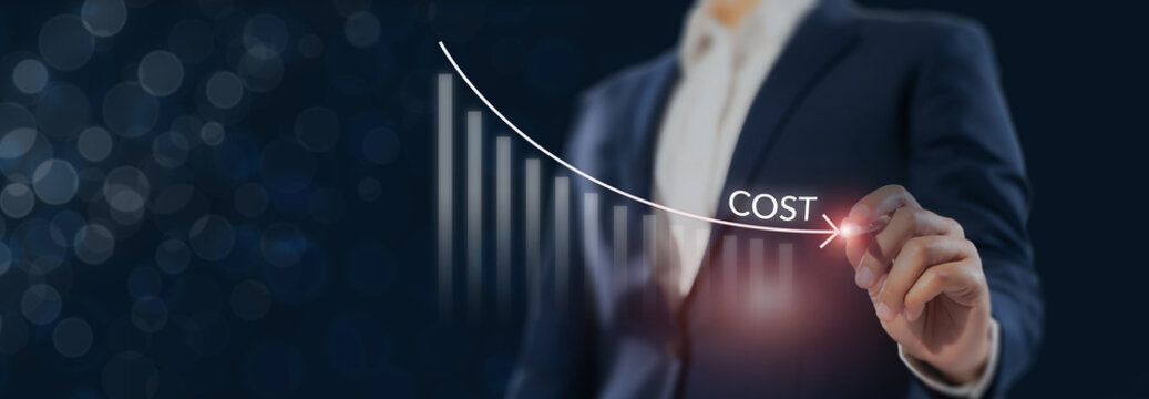  Business cost reduction concept. Drawing a downward curve labeled "COST" over a bar chart, manage financial challenge during economic downturns. Concept of financial efficiency and corporate savings.