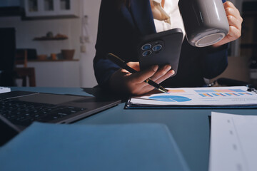 Expert woman asian female people review data number costing managerial account prepare monthly...