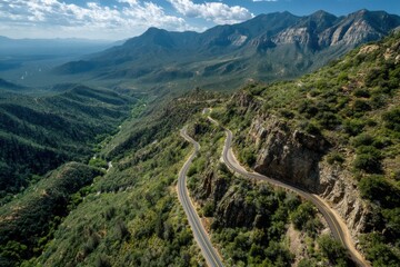 Stunning Aerial View of a Switchback Mountain Road Winding Through a Lush Green Valley in the Heart of Nature Generative AI