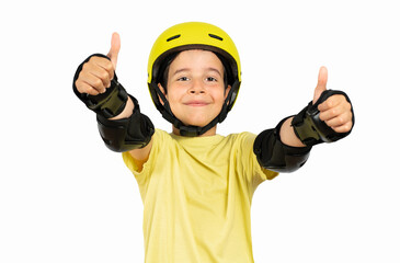 Kid wearing skate yellow helmet approving doing positive gesture with hand, thumbs up smiling and...