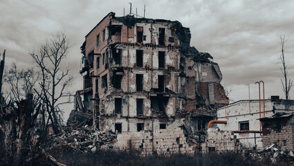 ruined street and destroyed houses the city war in Ukraine
