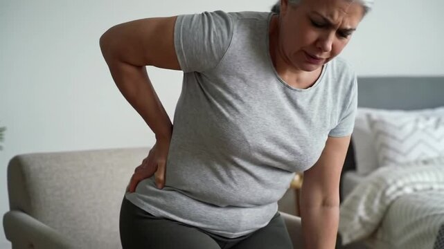 Mature Woman Experiencing Lower Back and Hip Pain