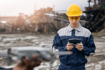 Using uavs and drones for monitoring sand and ore mining processes in open quarry with surveying...