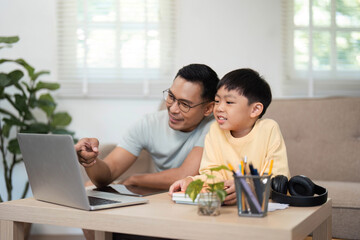 Homeschooling fun with father and son learning together