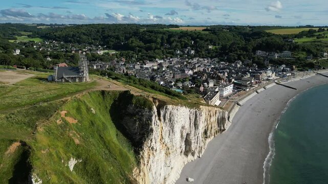 Aerial high angle shot of etretat and famous natural landmark Falaise of Aval white cliffs