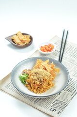 Indonesian Fried Noodles dish, mie goreng, cooked with spicy spices and a unique taste.