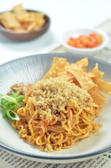 Indonesian Fried Noodles dish, mie goreng, cooked with spicy spices and a unique taste.