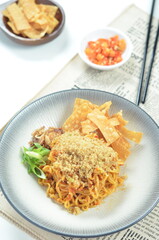 Indonesian Fried Noodles dish, mie goreng, cooked with spicy spices and a unique taste.