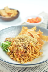 Indonesian Fried Noodles dish, mie goreng, cooked with spicy spices and a unique taste.