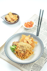 Indonesian Fried Noodles dish, mie goreng, cooked with spicy spices and a unique taste.