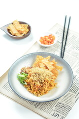 Indonesian Fried Noodles dish, mie goreng, cooked with spicy spices and a unique taste.