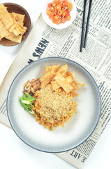 Indonesian Fried Noodles dish, mie goreng, cooked with spicy spices and a unique taste.