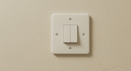 Light switch on beige wall