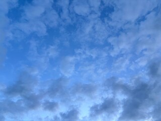 bright blue sky background with beautiful white clouds, clear sky in the afternoon