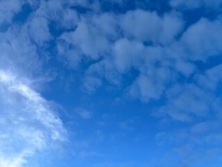 Fototapeta premium bright blue sky background with beautiful white clouds, clear sky in the afternoon
