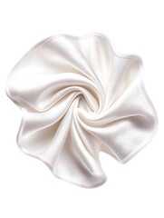 A white silk pocket square is folded into a spiral shape